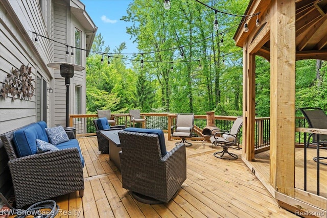 1307 Trillium Ct, Wixom, MI 48393 - wooden deck with an outdoor hangout area