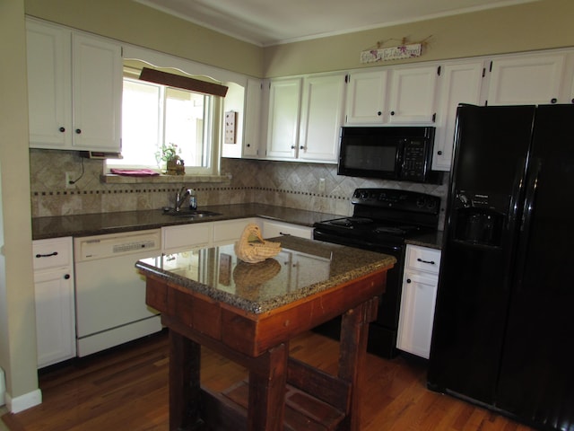 9920 Camridge Ct, South Lyon, MI 48178 - kitchen with black appliances, a sink, white cabinets, and crown molding