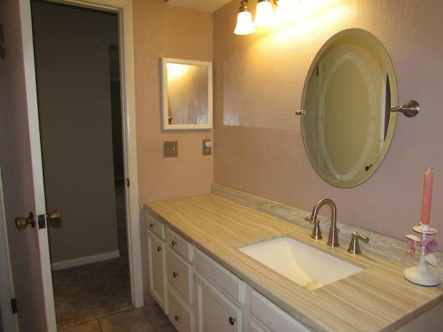 9920 Camridge Ct, South Lyon, MI 48178 - bathroom with vanity and tile patterned floors