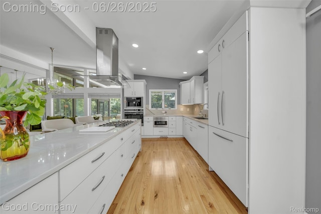 30239 Hickory Ln, Franklin, MI 48025 - kitchen with wall chimney range hood, stainless steel oven, recessed lighting, light wood finished floors, and light countertops