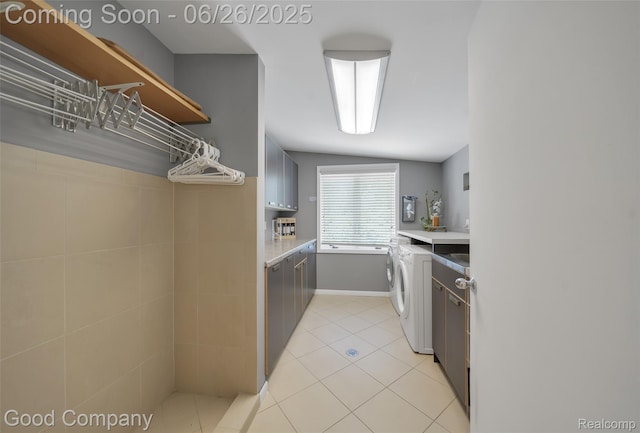 30239 Hickory Ln, Franklin, MI 48025 - laundry room featuring washer / clothes dryer and light tile patterned floors