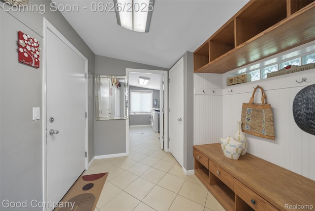 30239 Hickory Ln, Franklin, MI 48025 - mudroom with lofted ceiling and light tile patterned floors