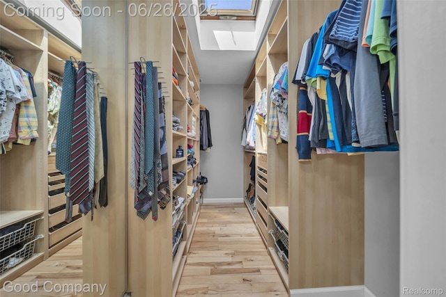 30239 Hickory Ln, Franklin, MI 48025 - walk in closet with a skylight and wood finished floors