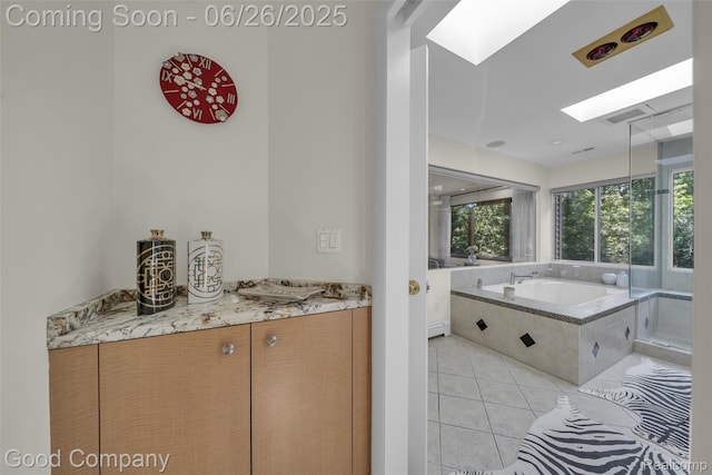 30239 Hickory Ln, Franklin, MI 48025 - full bath with a skylight, tile patterned flooring, a bath, and vanity
