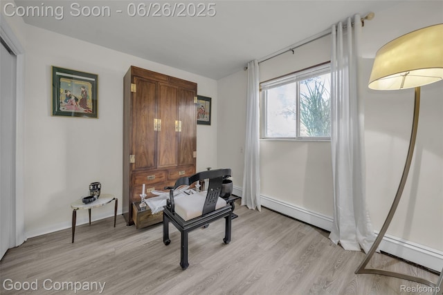 30239 Hickory Ln, Franklin, MI 48025 - home office with baseboard heating and light wood-style flooring