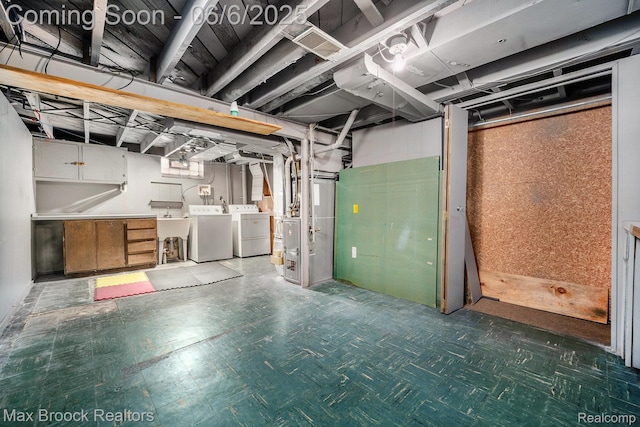 15255 Horger Ave, Allen Park, MI 48101 - unfinished basement with washing machine and clothes dryer, tile patterned floors, and a sink