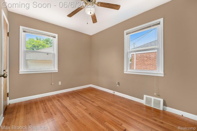 15255 Horger Ave, Allen Park, MI 48101 - spare room featuring light wood-style floors, baseboards, plenty of natural light, and ceiling fan