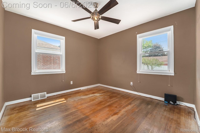 15255 Horger Ave, Allen Park, MI 48101 - unfurnished room featuring healthy amount of natural light, ceiling fan, baseboards, and wood finished floors
