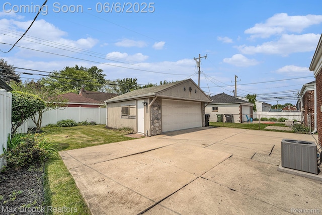 15255 Horger Ave, Allen Park, MI 48101 - view of side of property featuring central AC, a garage, an outbuilding, and stone siding
