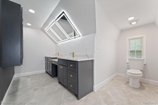 17169 Griggs St, Detroit, MI 48221 - bathroom featuring marble look tiles, vanity, lofted ceiling, baseboards, and toilet