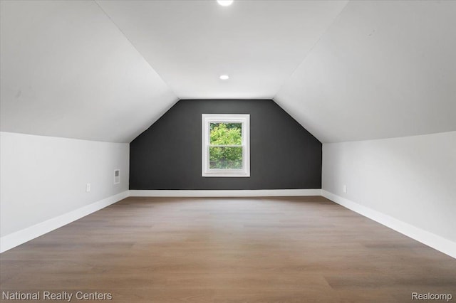 17169 Griggs St, Detroit, MI 48221 - additional living space featuring baseboards, wood finished floors, vaulted ceiling, and recessed lighting