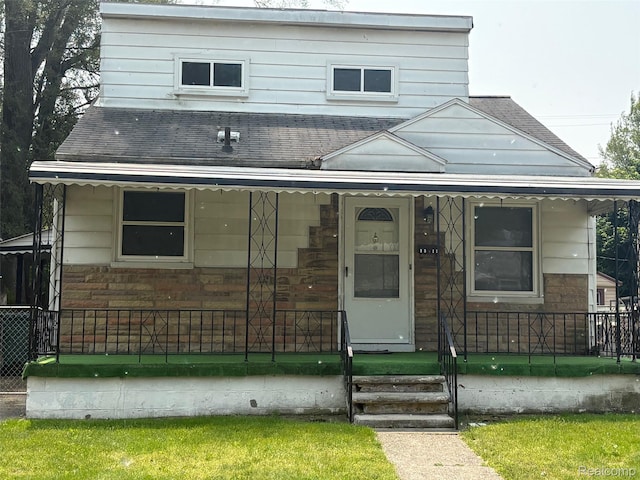 1512 E Evelyn Ave, Hazel Park, MI 48030 - view of front of property featuring covered porch and roof with shingles