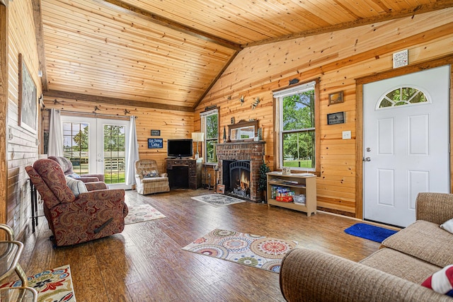 32205 James St, Colon, MI 49040 - living area featuring a brick fireplace, healthy amount of natural light, wooden walls, hardwood / wood-style floors, and wood ceiling