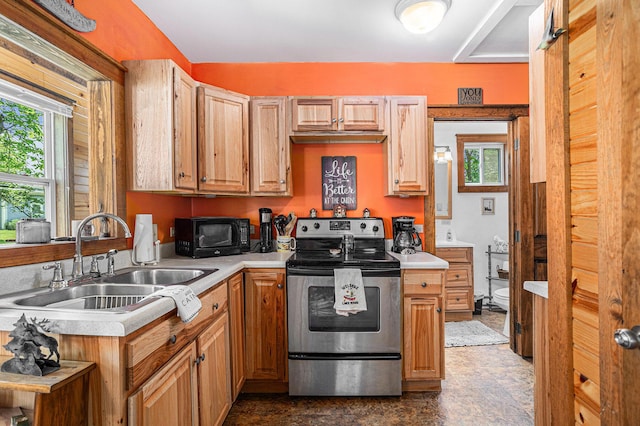 32205 James St, Colon, MI 49040 - kitchen with electric stove, a sink, and light countertops