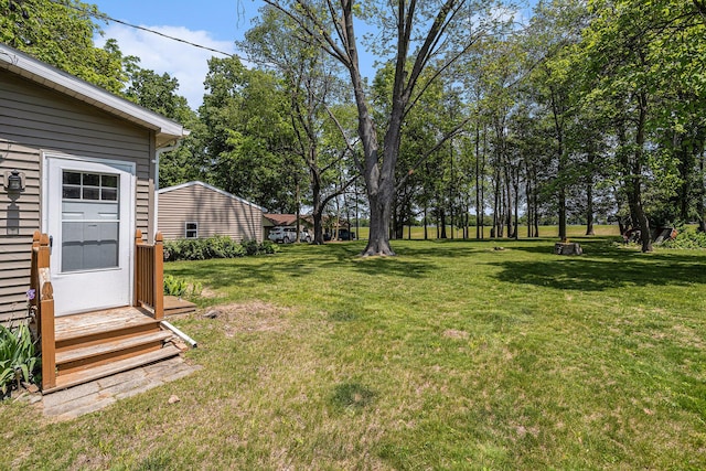 32205 James St, Colon, MI 49040 - view of green lawn featuring entry steps