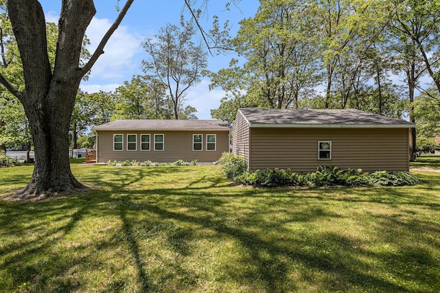 32205 James St, Colon, MI 49040 - back of house with a lawn
