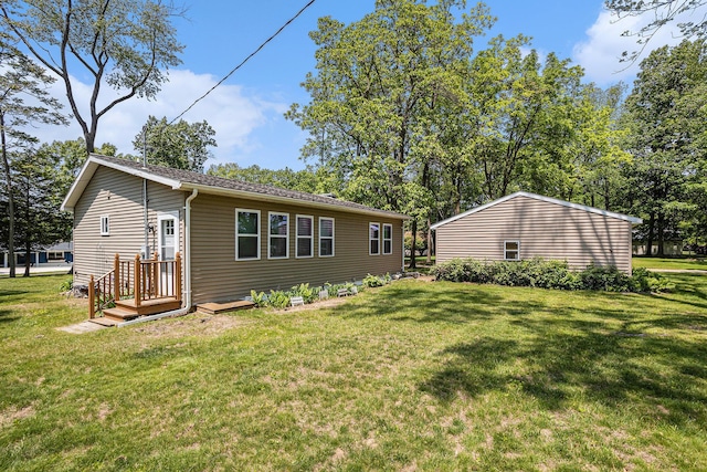 32205 James St, Colon, MI 49040 - rear view of house with a yard
