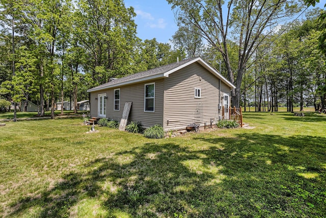 32205 James St, Colon, MI 49040 - view of home's exterior featuring a yard and view of scattered trees