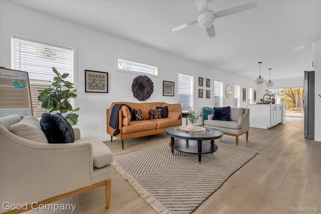 2819 16th St, Detroit, MI 48216 - living room featuring light wood finished floors and a ceiling fan