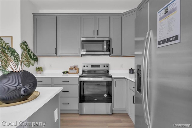 2827 16th St, Detroit, MI 48216 - kitchen with stainless steel appliances and gray cabinets
