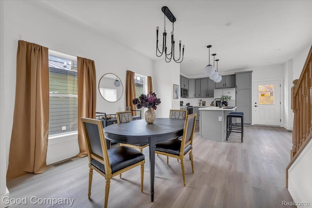 2827 16th St, Detroit, MI 48216 - dining area featuring healthy amount of natural light and light wood-type flooring