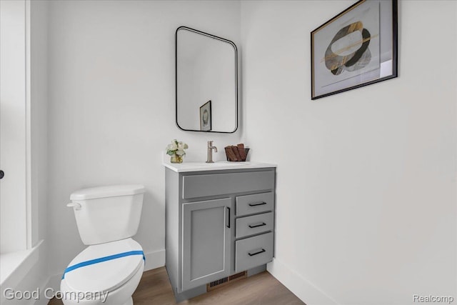 2827 16th St, Detroit, MI 48216 - bathroom featuring vanity and wood finished floors