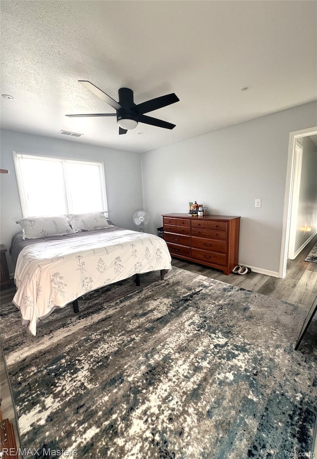 1565 Harbour Blvd Unit 182, Trenton, MI 48183 - bedroom with wood finished floors and ceiling fan
