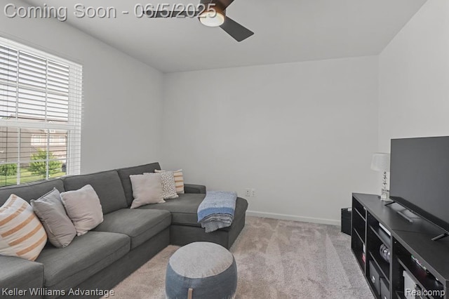 861 N Mill St, South Lyon, MI 48178 - carpeted living room with a ceiling fan and baseboards