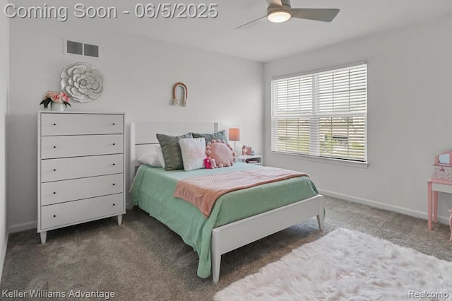861 N Mill St, South Lyon, MI 48178 - carpeted bedroom featuring baseboards and a ceiling fan