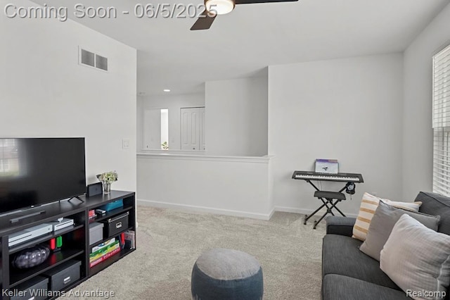 861 N Mill St, South Lyon, MI 48178 - living area with carpet, ceiling fan, and baseboards