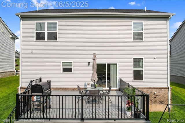 861 N Mill St, South Lyon, MI 48178 - back of house featuring a patio area and a lawn