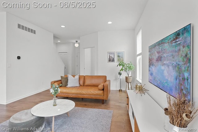 861 N Mill St, South Lyon, MI 48178 - living room featuring light wood finished floors, recessed lighting, and baseboards