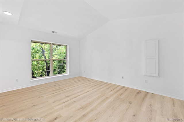 7127 Copper Creek Cir, Canton, MI 48187 - empty room featuring vaulted ceiling, wood finished floors, baseboards, and recessed lighting