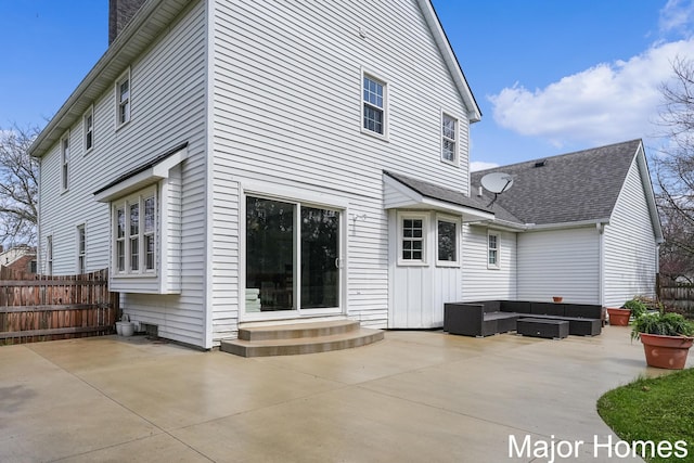 7125 Brooklyn Ave SE, Grand Rapids, MI 49508 - back of property featuring a patio area and roof with shingles