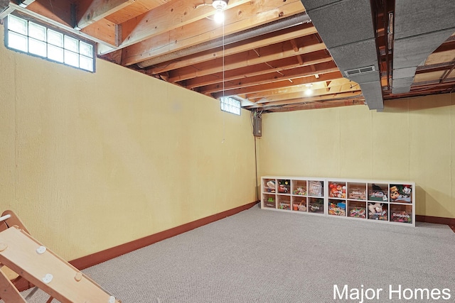 7125 Brooklyn Ave SE, Grand Rapids, MI 49508 - basement featuring healthy amount of natural light, carpet floors, and baseboards
