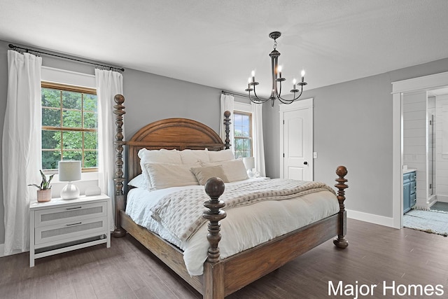 7125 Brooklyn Ave SE, Grand Rapids, MI 49508 - bedroom featuring a chandelier, wood finished floors, multiple windows, and baseboards