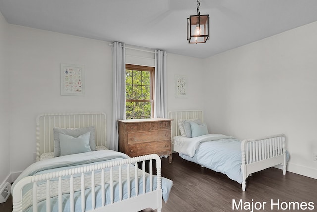 7125 Brooklyn Ave SE, Grand Rapids, MI 49508 - bedroom featuring wood finished floors and baseboards