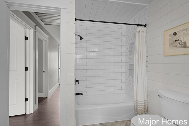 7125 Brooklyn Ave SE, Grand Rapids, MI 49508 - full bathroom with shower / tub combo with curtain, toilet, wooden walls, and wood finished floors
