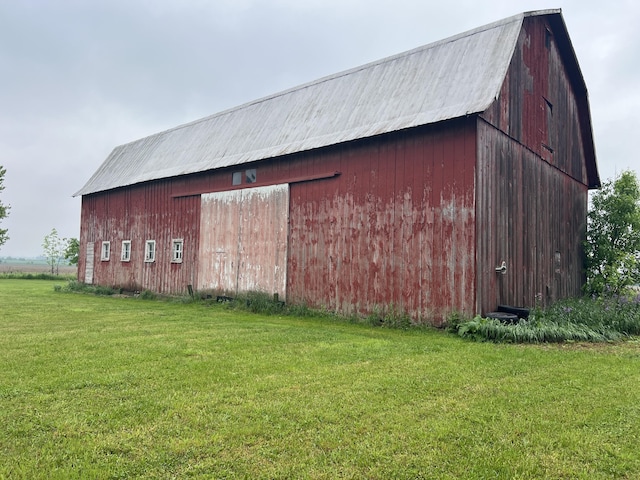 855 E Hansen Rd, Scottville, MI 49454 - view of barn with a lawn