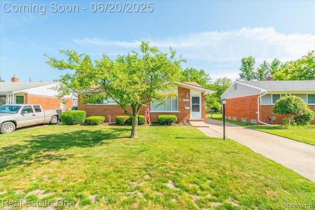 32622 Parkwood St, Westland, MI 48186 - view of front of property with brick siding and a front lawn