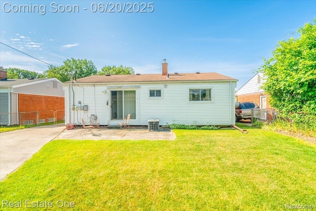 32622 Parkwood St, Westland, MI 48186 - back of house featuring a patio area and a chimney