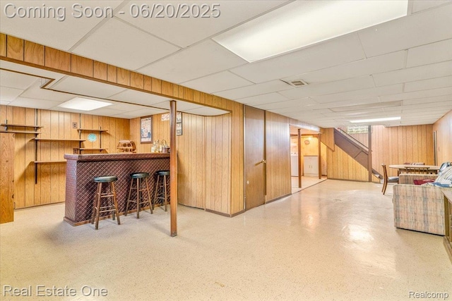 32622 Parkwood St, Westland, MI 48186 - indoor dry bar with wood walls, a paneled ceiling, and washer / clothes dryer