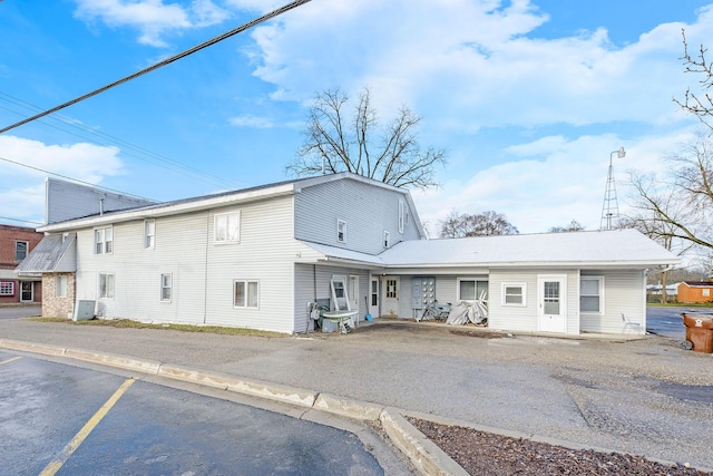 707 Maple St, Big Rapids, MI 49307 - back of property with uncovered parking