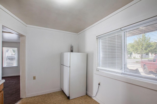 707 Maple St, Big Rapids, MI 49307 - kitchen with freestanding refrigerator and baseboards