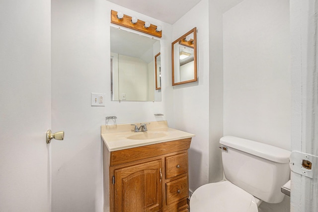 707 Maple St, Big Rapids, MI 49307 - half bathroom with toilet and vanity