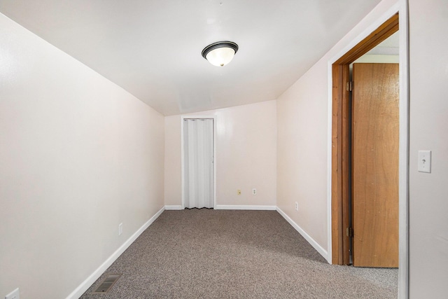 707 Maple St, Big Rapids, MI 49307 - bonus room featuring carpet flooring, baseboards, and vaulted ceiling