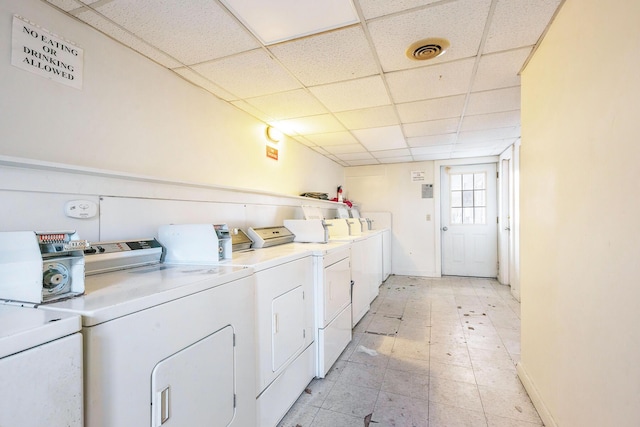 707 Maple St, Big Rapids, MI 49307 - shared laundry featuring washing machine and clothes dryer and baseboards