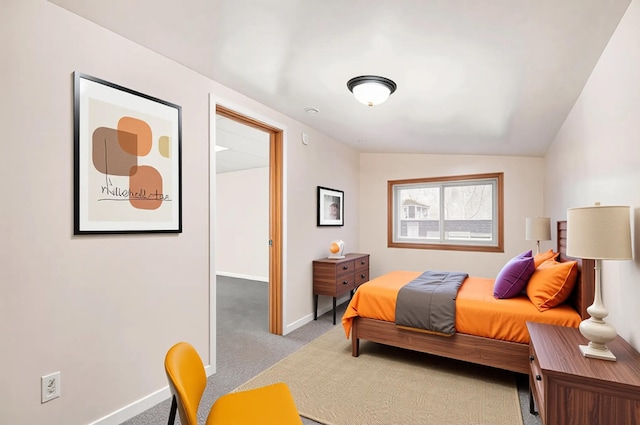 707 Maple St, Big Rapids, MI 49307 - bedroom with light colored carpet and baseboards