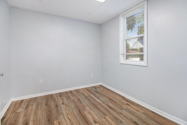 707 Maple St, Big Rapids, MI 49307 - spare room featuring wood finished floors and baseboards
