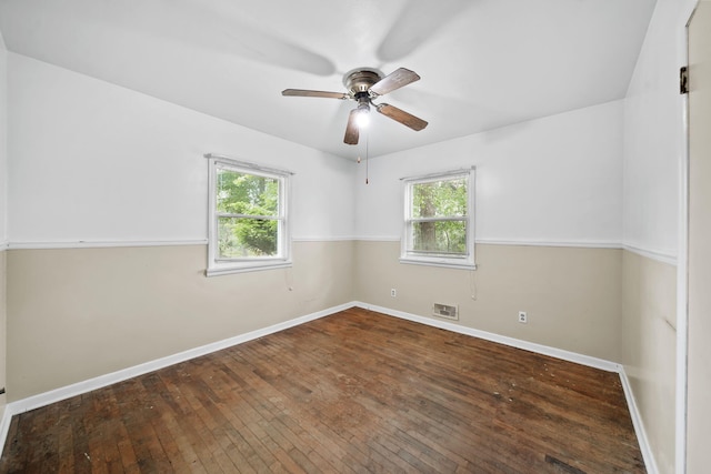 311 Rosehill Rd, Jackson, MI 49202 - spare room with plenty of natural light, ceiling fan, hardwood / wood-style flooring, and baseboards